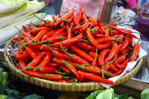 Chilies sold at traditional market on Borneo, Malaysia - by Authentic World Food