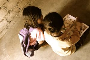 kids reading at school in Lombok village, Indonesia