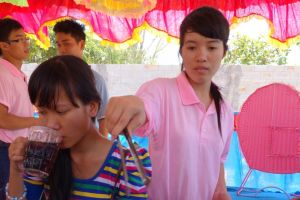 full time job for a waitress at Vietnamese wedding is ice delivery, mainly for beer