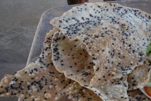 sesame cracker - roasted rice paper, torn and ready as a side dish for lunch