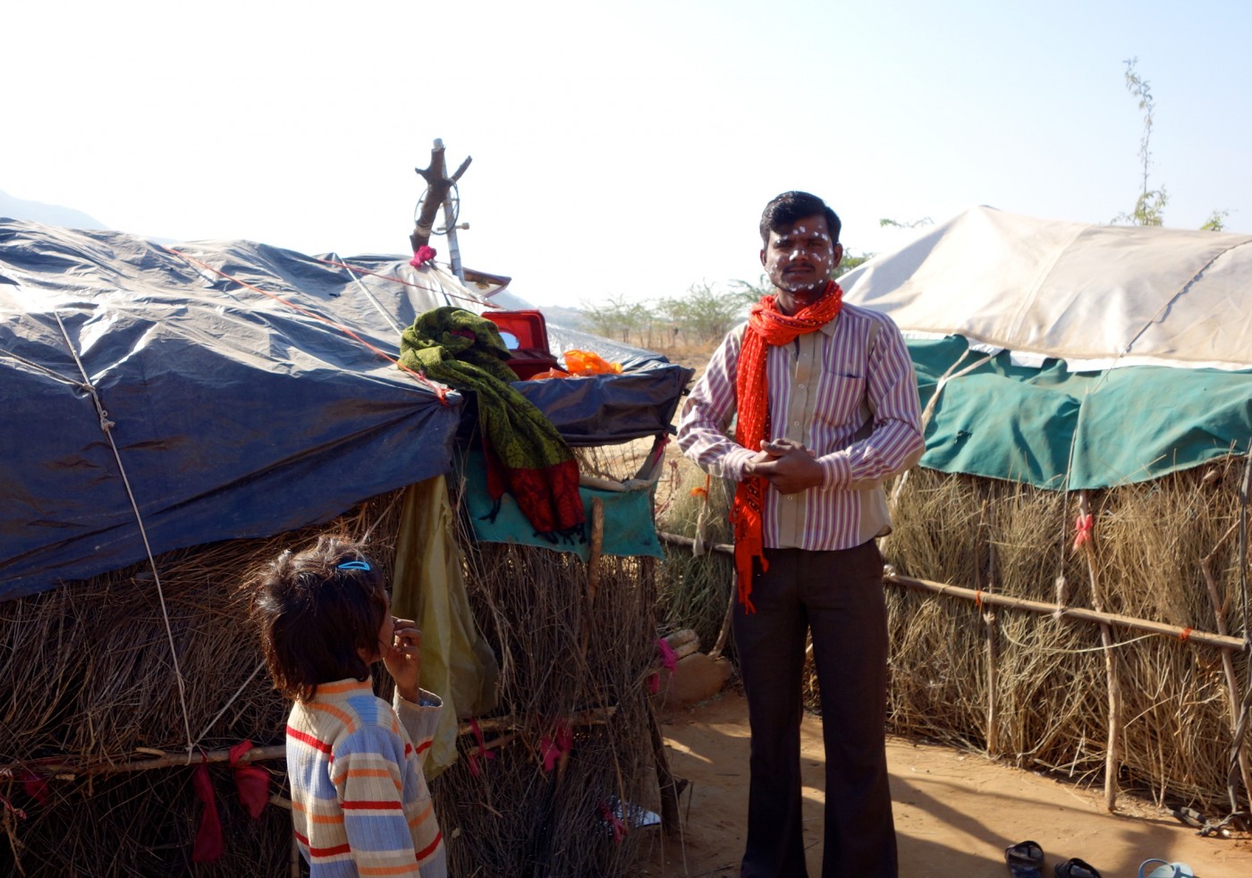 Ram, a gipsy from Pushkar getting ready for his job in Pushkar, playing ravanhattha, India