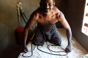 Indian fisherman keeping fit