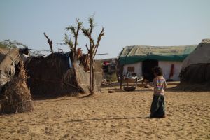 a gipsy girl in a village in Rajasthan desert, India