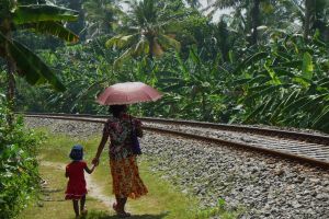 next to the sri lanka house by train tracks