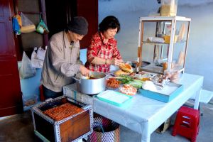 Banh mi - Vietnamese baguettes prepared on the street
