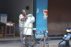 Milkman in Kerala, India - by Authentic World Food