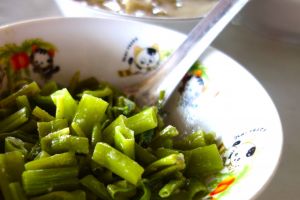 Water spinach stalks in a coconut sauce