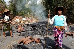 Burning traditional mortar chobek in Lombok, Indonesia by Authentic World Food