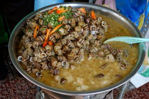 Snails cooked in ginger, lemongrass and chili