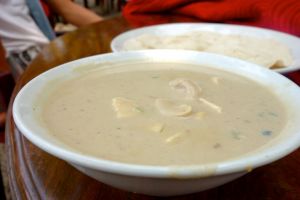 Paneer and cashew nuts in a white gravy