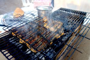 Fish kefta - Moroccan fish balls - being grilled straight in the streets of Morocco - by Authentic World Food